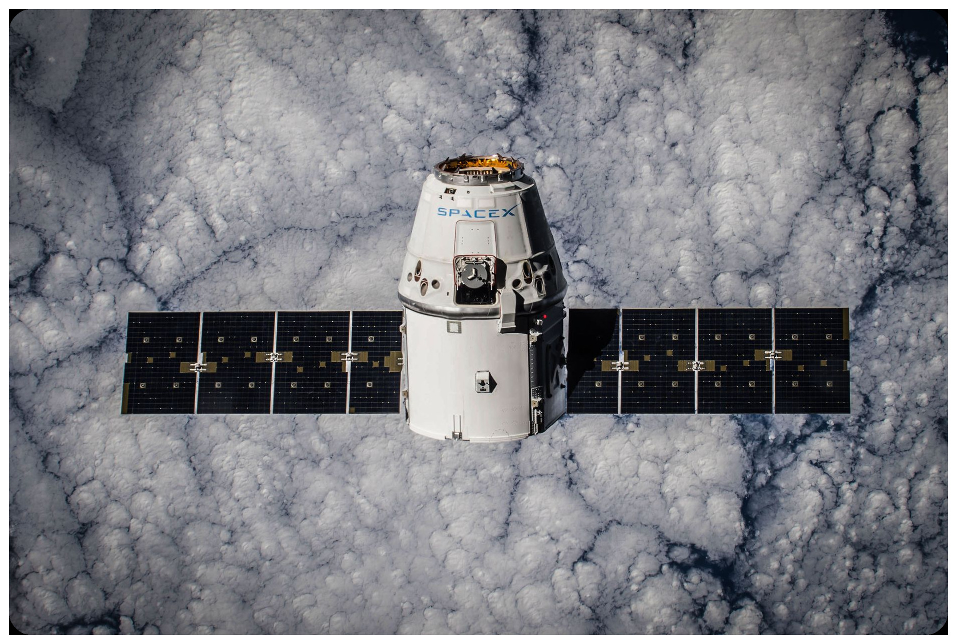 International Space Station orbiting Earth with solar panels and modules against starry cosmos, 400km altitude