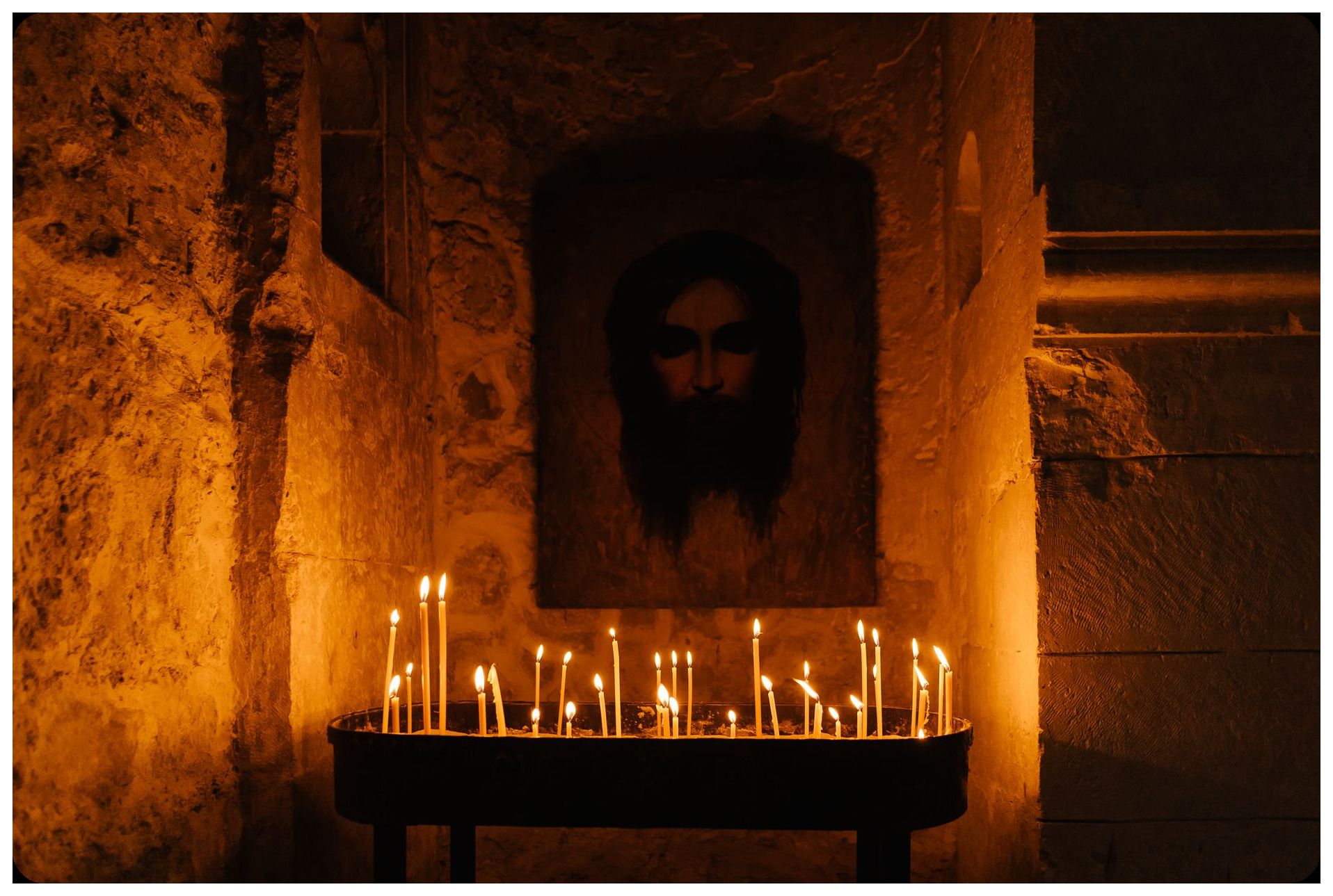 austere seventeenth century convent interior stone walls candlelight carmelite nuns prayer chamber dramatic