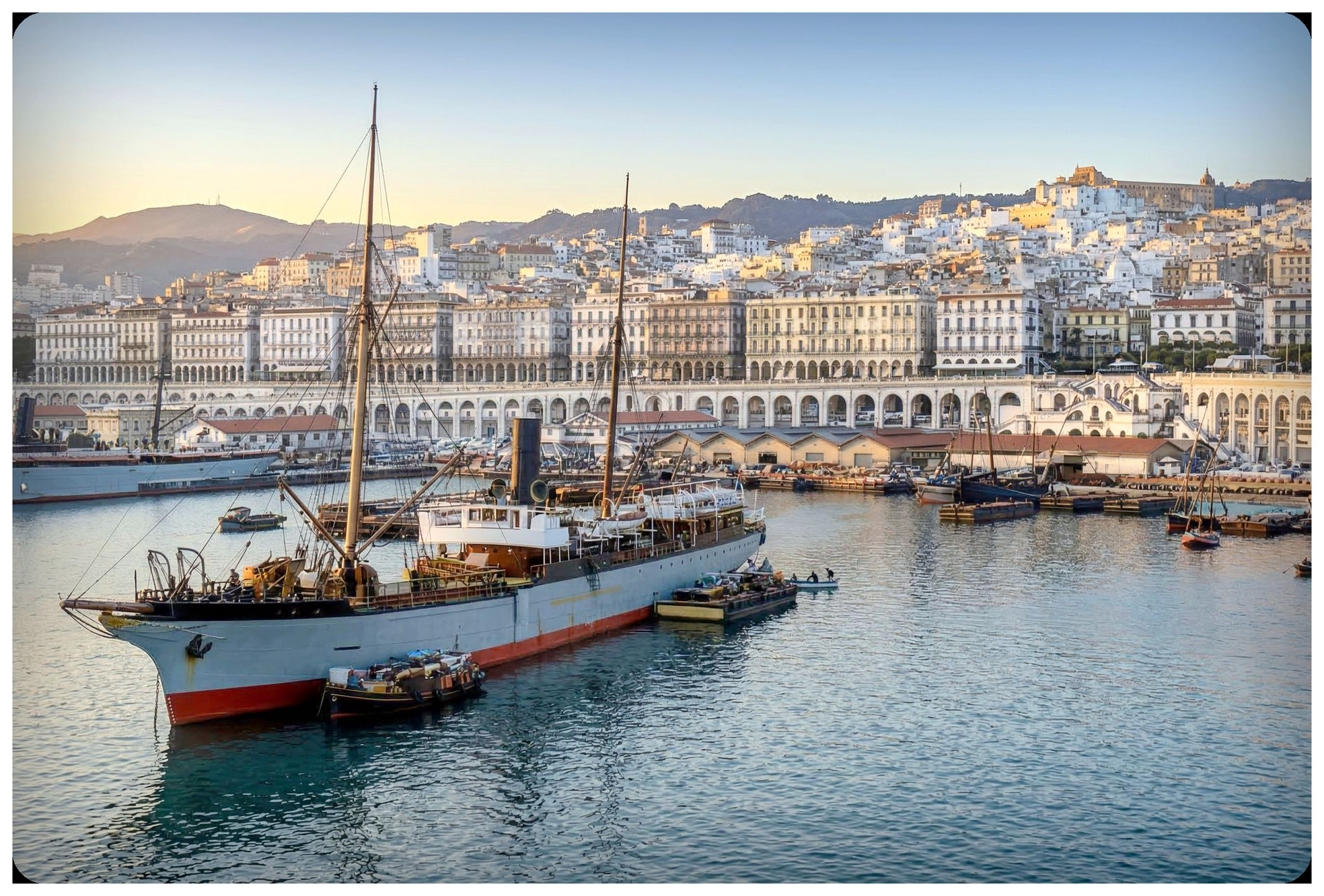reconstructed view of ancient Valentia port with iberian merchant ships, mediterranean harbor scene, historical architecture and trading activity