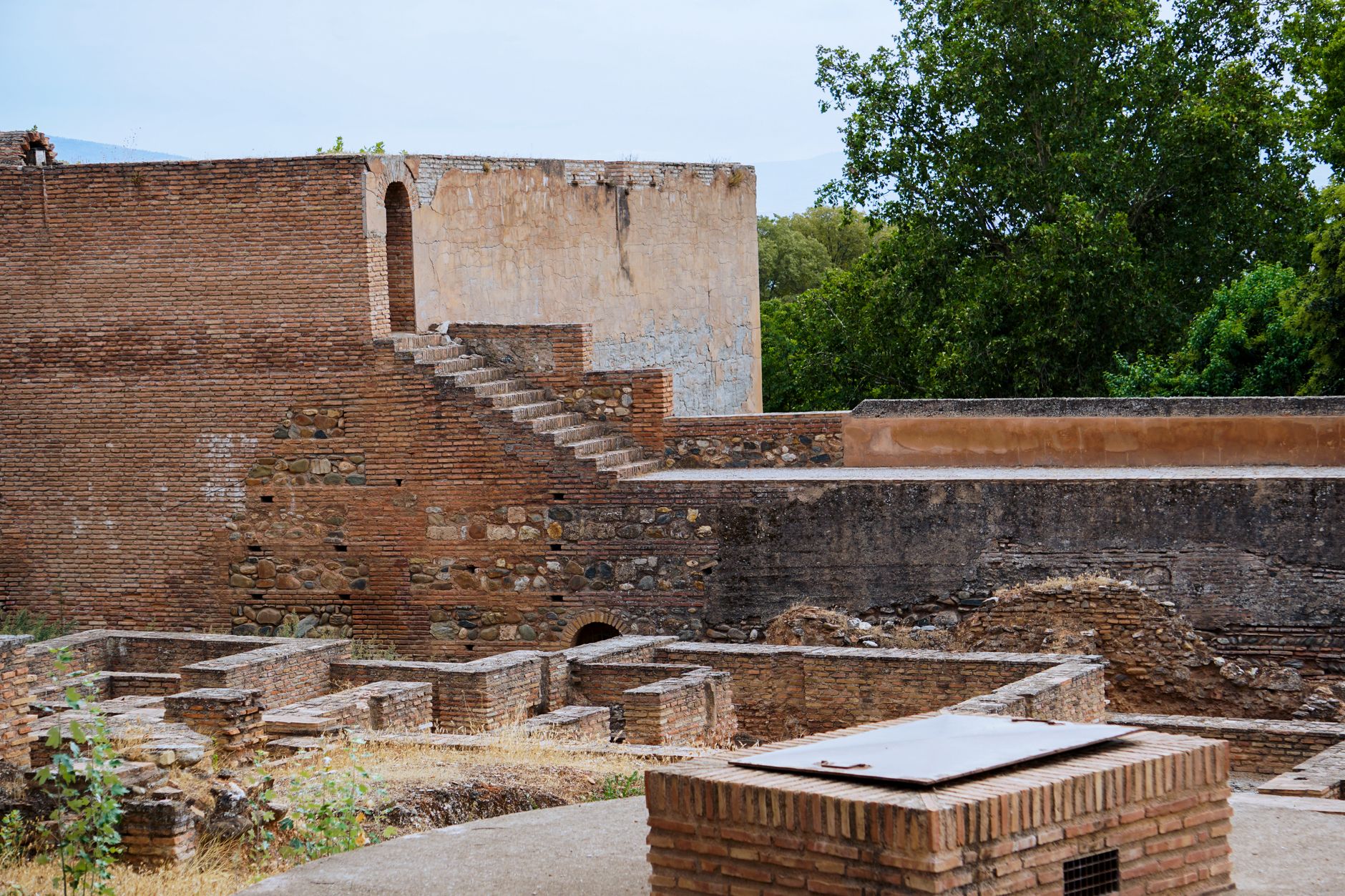 ancient copper age fortress ruins three walls towers archaeological excavation extremadura spain golden hour