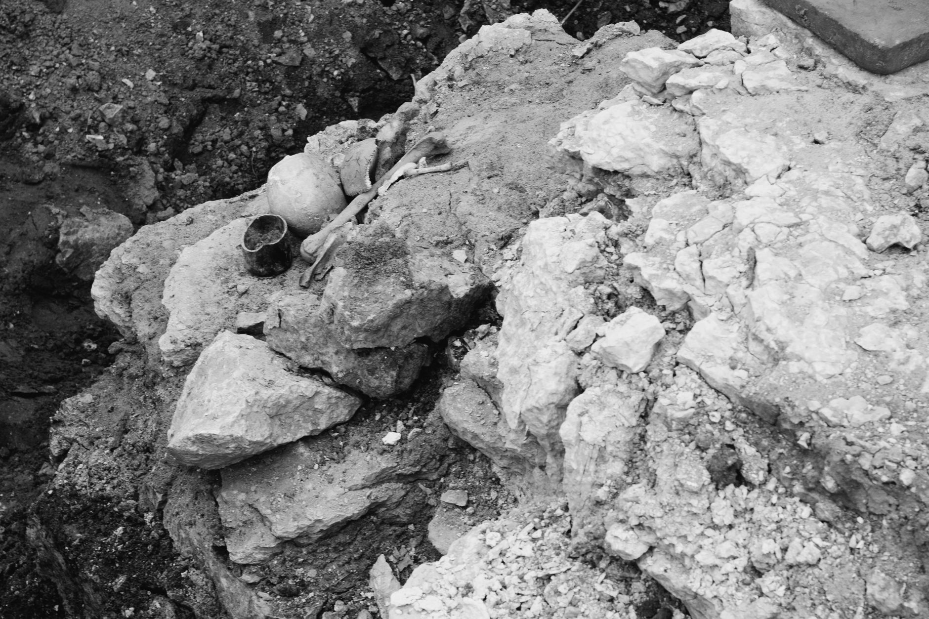 neanderthal hearth with stone tools inside ancient cave archaeological dig